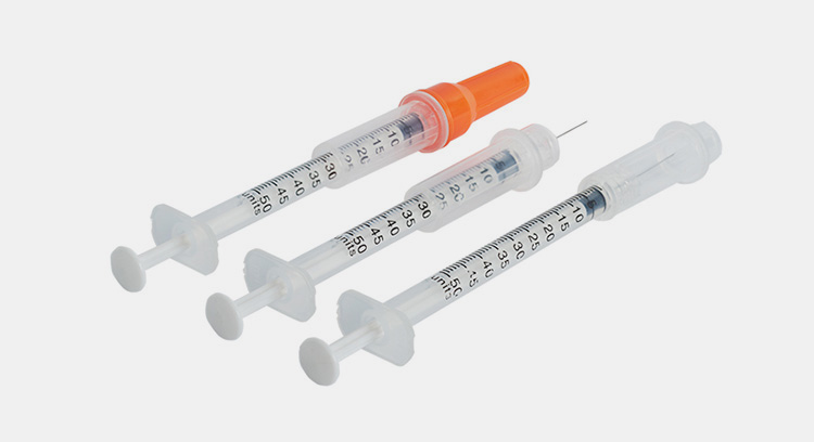 Safety syringes