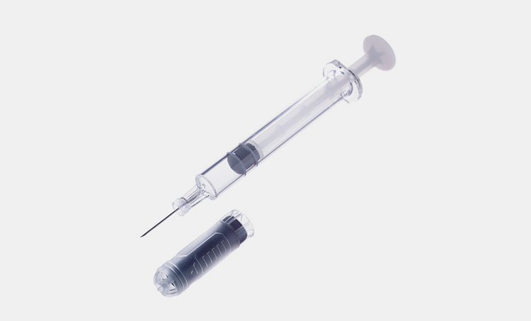 Staked needle syringes