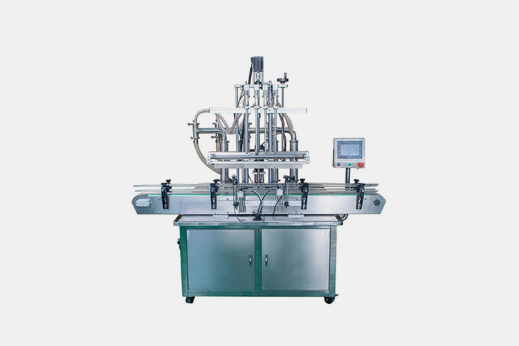Nozzle-or-applicator-tip-bottle-filling-machine