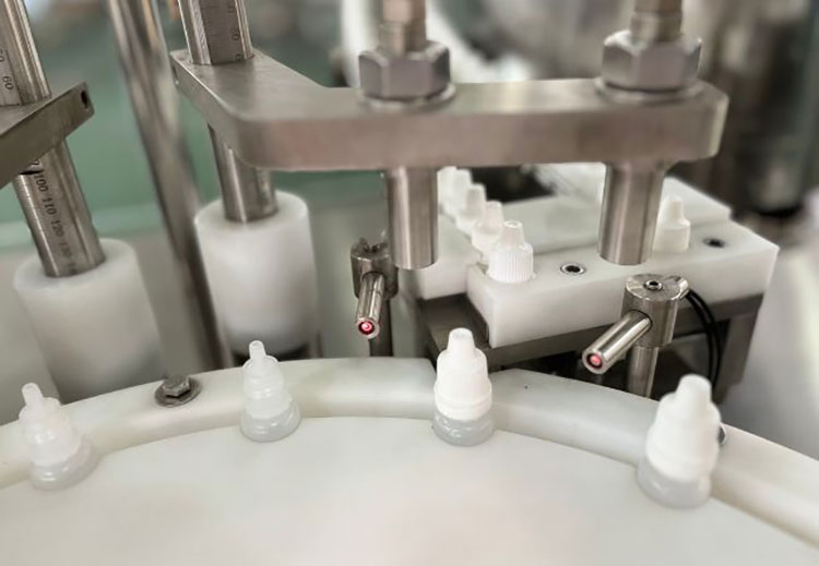 Sealing of filled cvs ear drops bottles-Picture courtesy